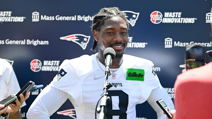 Jul 23, 2025; Foxborough, MA, USA; New England Patriots wide receiver Stefon Diggs (8) addresses the media after practice during day one of training camp at Gillette Stadium. Mandatory Credit: Eric Canha-Imagn Images