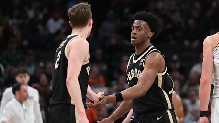 Purdue Boilermakers guard Fletcher Loyer (2) high-fives guard Myles Colvin (5) Purdue Boilermakers guard Fletcher Loyer (2) high-fives guard Myles Colvin (5)