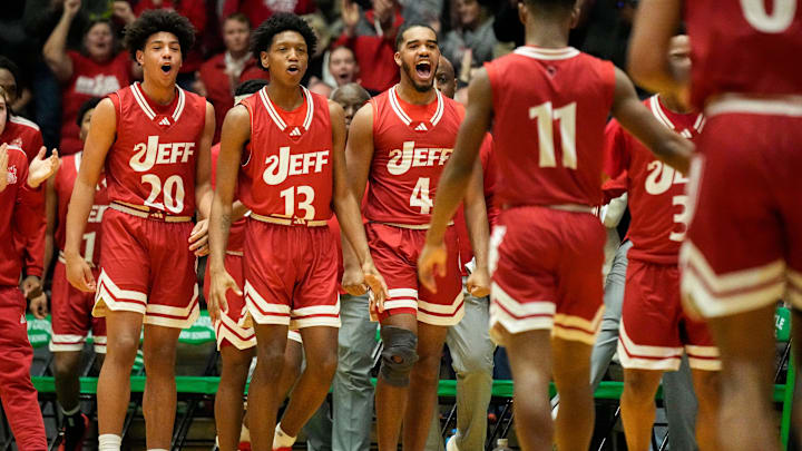 Jeffersonville Red Devils players yell in excitement Saturday, March 22, 2025, during the game at New Castle Fieldhouse in New Castle. The Jeffersonville Red Devils defeated the Mt. Vernon Marauders, 63-59..