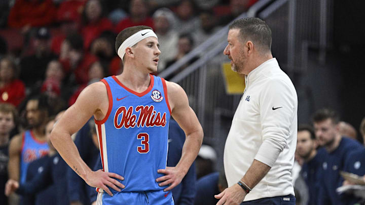 Dec 3, 2024; Louisville, Kentucky, USA;  Mississippi Rebels head coach Chris Beard talks with guard Sean Pedulla (3) during the second half against the Louisville Cardinals at KFC Yum! Center. Mandatory Credit: Jamie Rhodes-Imagn Images