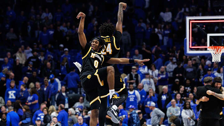 Jan 7, 2026; Lexington, Kentucky, USA; Missouri Tigers guard Anthony Robinson II (0) and forward Nicholas Randall (24) celebrate after winning the game against the Kentucky Wildcats at Rupp Arena at Central Bank Center. Mandatory Credit: Jordan Prather-Imagn Images