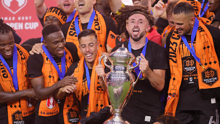 Sep 27, 2023; Fort Lauderdale, FL, USA; Houston Dynamo midfielder Hector Herrera (16) celebrates with teammates after winning the Lamar Hunt U.S. Open Cup Final against Inter Miami CF at DRV PNK Stadium. Mandatory Credit: Sam Navarro-Imagn Images