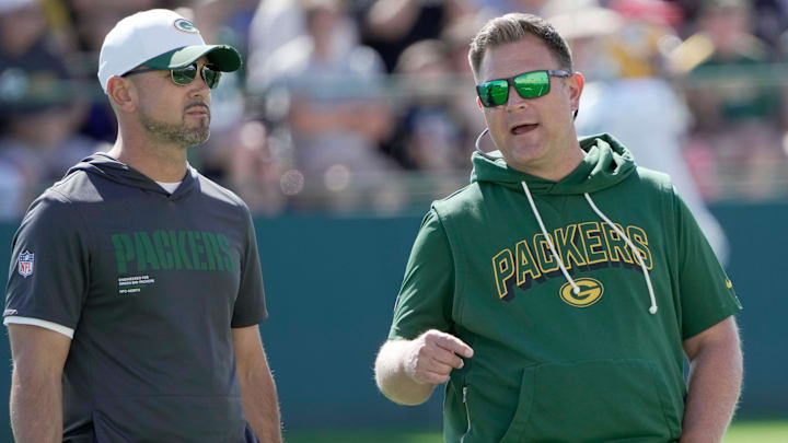 Green Bay Packers head coach Matt LaFleur, left, and general manager Brian Gutekunst talk during joint practice against the Seahawks on Thursday.