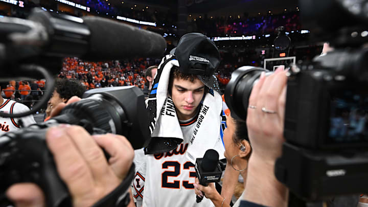 Mar 28, 2026; Houston, TX, USA; Illinois Fighting Illini guard Keaton Wagler (23) speaks to media after defeating the Iowa Hawkeyes in an Elite Eight game of the South Regional of the men's 2026 NCAA Tournament at Toyota Center. Mandatory Credit: Maria Lysaker-Imagn Images
