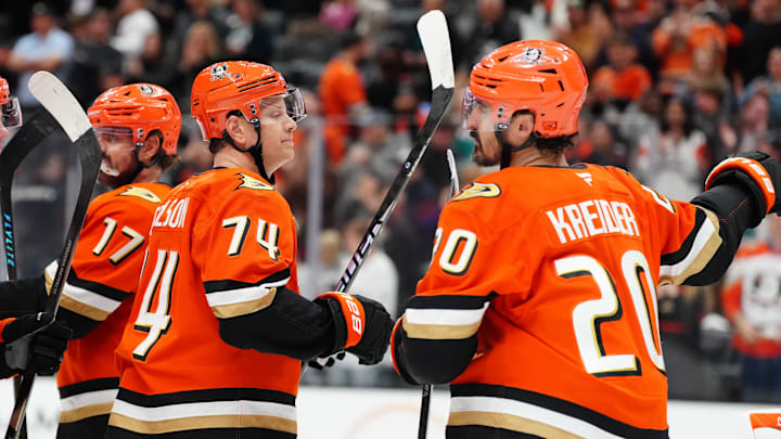 Apr 9, 2026; Anaheim, California, USA; Anaheim Ducks defenseman John Carlson (74) and left wing Chris Kreider (20) celebrate after the game against the San Jose Sharks at the Honda Center. Mandatory Credit: Kirby Lee-Imagn Images