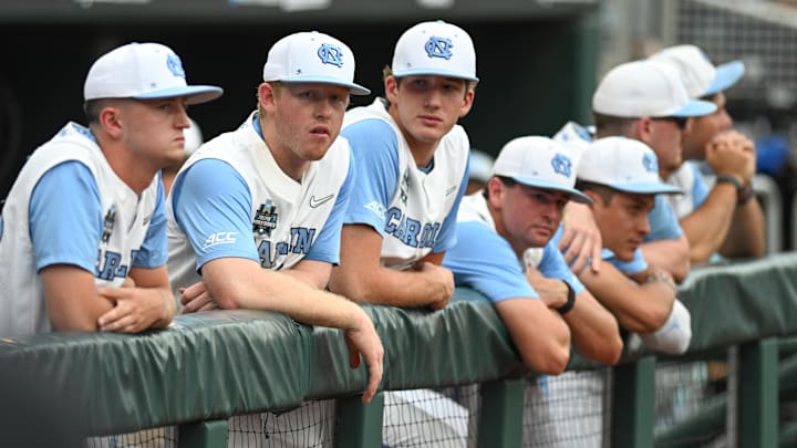 Jun 18, 2024; Omaha, NE, USA; North Carolina Tar Heels players look an after a loss against the Florida State Seminoles at Charles Schwab Field Omaha. Mandatory Credit: Steven Branscombe-Imagn Images Jun 18, 2024; Omaha, NE, USA; North Carolina Tar Heels players look an after a loss against the Florida State Seminoles at Charles Schwab Field Omaha. Mandatory Credit: Steven Branscombe-Imagn Images