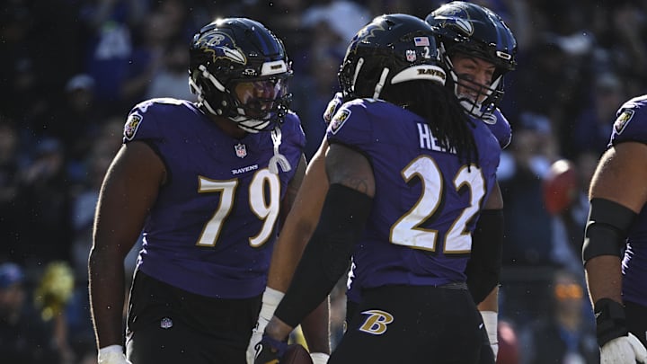 Nov 3, 2024; Baltimore, Maryland, USA;  Baltimore Ravens running back Derrick Henry (22)  celebrates with offensive tackle Ronnie Stanley (79)  after scoring a touchdown  during the first half against the Denver Broncos at M&T Bank Stadium. Mandatory Credit: Tommy Gilligan-Imagn Images