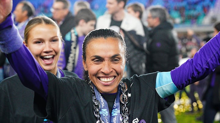 Orlando Pride forward Marta celebrates after winning the 2024 NWSL Championship match at CPKC Stadium.