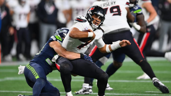 Oct 20, 2025; Seattle, Washington, USA; Seattle Seahawks safety Ty Okada (39) sacks Houston Texans quarterback C.J. Stroud (7) during the fourth quarter at Lumen Field. Mandatory Credit: Steven Bisig-Imagn Images Oct 20, 2025; Seattle, Washington, USA; Seattle Seahawks safety Ty Okada (39) sacks Houston Texans quarterback C.J. Stroud (7) during the fourth quarter at Lumen Field. Mandatory Credit: Steven Bisig-Imagn Images