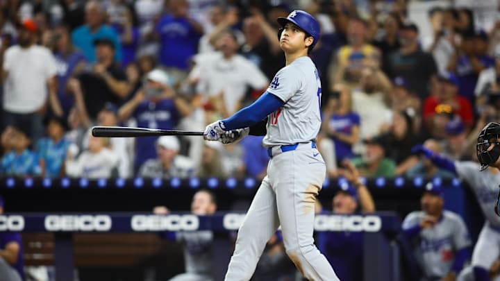 Ohtani hits a two-run home run, his 50th of the season, against the Miami Marlins during the seventh inning at loanDepot Park.