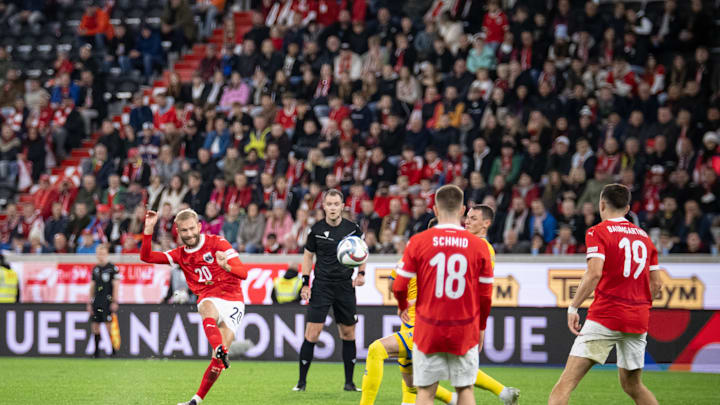Konrad Laimer gets a shot off for Austria in their nations league game against Kazakhstan