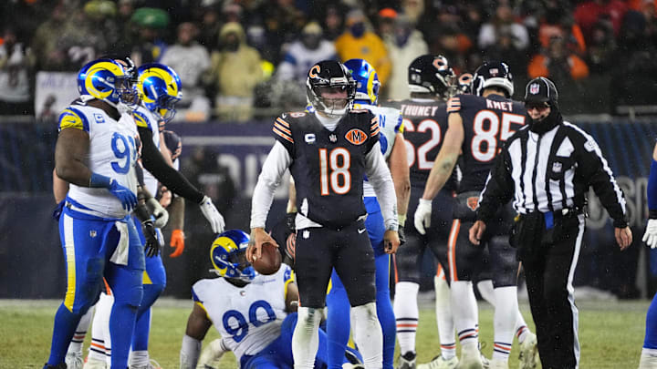 Jan 18, 2026; Chicago, IL, USA; Chicago Bears quarterback Caleb Williams (18) looks on against the Los Angeles Rams during overtime of an NFC Divisional Round game at Soldier Field. Mandatory Credit: David Banks-Imagn Images