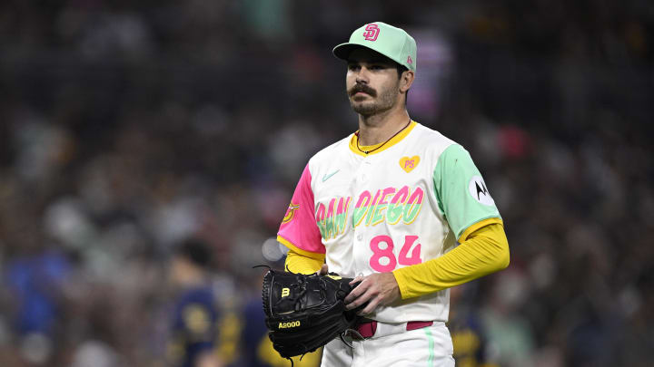 Jun 21, 2024; San Diego, California, USA; San Diego Padres starting pitcher Dylan Cease (84) walks to the dugout after a pitching change during the fifth inning against the Milwaukee Brewers at Petco Park. Mandatory Credit: Orlando Ramirez-USA TODAY Sports