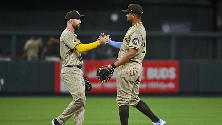Aug 26, 2024; St. Louis, Missouri, USA;  San Diego Padres relief pitcher Robert Suarez (75) celebrates with second baseman Xander Bogaerts (2) after the Padres defeated the St. Louis Cardinals at Busch Stadium. Mandatory Credit: Jeff Curry-Imagn Images
