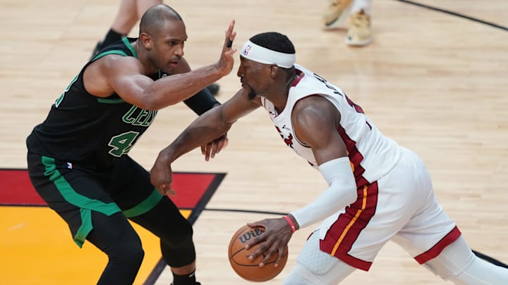 Apr 27, 2024; Miami, Florida, USA; Miami Heat center Bam Adebayo (13) drives to the basket as Boston's Al Horford defends - Jim Rassol/USA TODAY Sports