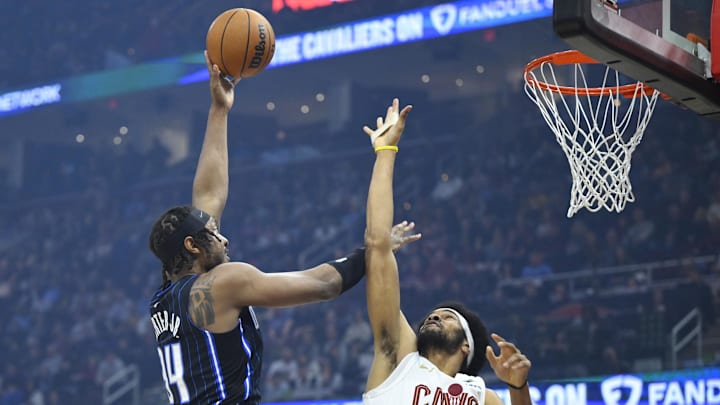 Orlando Magic center Wendell Carter Jr. (34) shoots beside Cleveland Cavaliers center Jarrett Allen (31) in the first quarter at Rocket Arena.