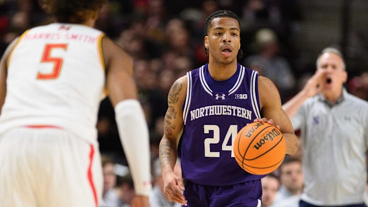 Mar 8, 2025; College Park, Maryland, USA; Northwestern Wildcats guard K.J. Windham (24) handles the ball during the first half against the Maryland Terrapins at Xfinity Center. Mandatory Credit: Reggie Hildred-Imagn Images