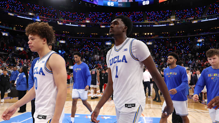 Nov 14, 2025; Inglewood, California, USA; UCLA Bruins guard Trent Perry (0) and center Xavier Booker (1) leave the court after defeated by the Arizona Wildcats 69-65 at Intuit Dome. Mandatory Credit: Kiyoshi Mio-Imagn Images Nov 14, 2025; Inglewood, California, USA; UCLA Bruins guard Trent Perry (0) and center Xavier Booker (1) leave the court after defeated by the Arizona Wildcats 69-65 at Intuit Dome. Mandatory Credit: Kiyoshi Mio-Imagn Images