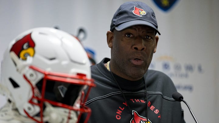Ron English, Offensive Coordinator for the Louisville football team, answers questions from the media during the coordinator news conference at the Hawthorn Suites in El Paso, Texas, on Saturday, Dec. 28, 2024.