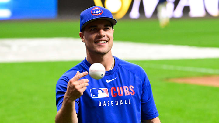 Oct. 6, 2025; Milwaukee, Wisconsin, USA; Chicago Cubs third baseman Matt Shaw (6) warms up before the game against the Milwaukee Brewers during game two of the NLDS round for the 2025 MLB playoffs at American Family Field.