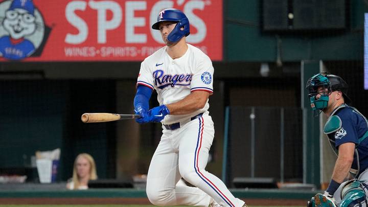Jul 25, 2026; Arlington, Texas, USA; Texas Rangers left fielder Wyatt Langford (36) follows through on his double against the Seattle Mariners during the first inning at Globe Life Field. Mandatory Credit: Jim Cowsert-Imagn Images Jul 25, 2026; Arlington, Texas, USA; Texas Rangers left fielder Wyatt Langford (36) follows through on his double against the Seattle Mariners during the first inning at Globe Life Field. Mandatory Credit: Jim Cowsert-Imagn Images