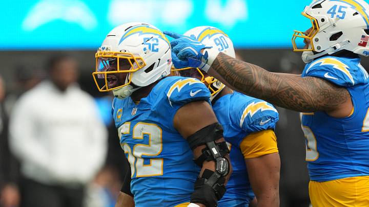 Sep 20, 2026; Inglewood, California, USA; Los Angeles Chargers linebacker Khalil Mack (52) and Los Angeles Chargers linebacker Tuli Tuipulotu (45) react after a play against the Las Vegas Raiders during the first half at SoFi Stadium. Mandatory Credit: Kirby Lee-Imagn Images Sep 20, 2026; Inglewood, California, USA; Los Angeles Chargers linebacker Khalil Mack (52) and Los Angeles Chargers linebacker Tuli Tuipulotu (45) react after a play against the Las Vegas Raiders during the first half at SoFi Stadium. Mandatory Credit: Kirby Lee-Imagn Images