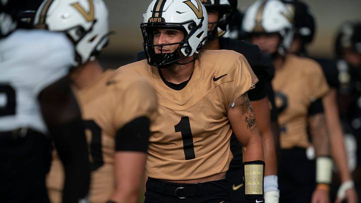 Vanderbilt quarterback Blaze Berlowitz (1) goes through warmups during practice at Vanderbilt University’s McGugin Center practice fields Wednesday, Aug. 19, 2026.