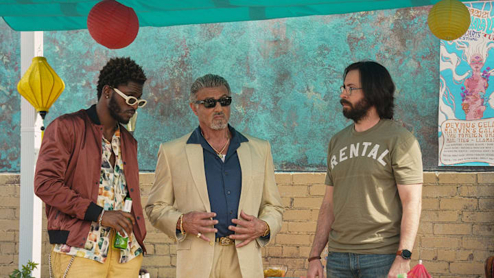 Jay Will as Tyson, Sylvester Stallone as Dwight Manfredi, and Martin Starr as Bodhi of the Paramount+ original series TULSA KING. Photo Cr: Brian Douglas/Paramount+. © 2022 Viacom International Inc. All Rights Reserved.