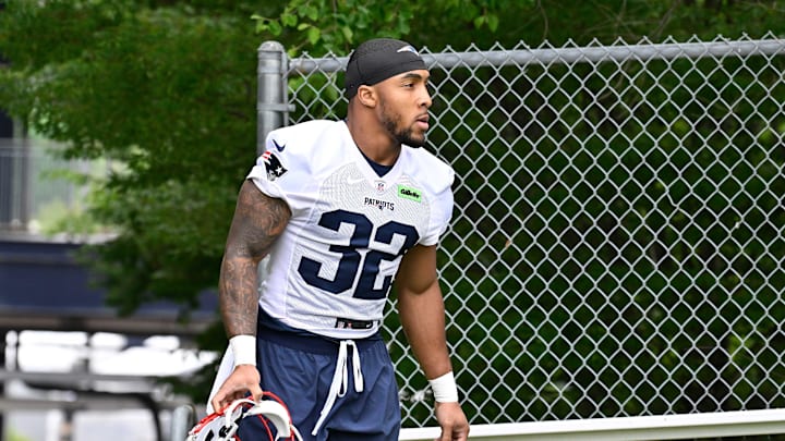 Jun 9, 2025; Foxborough, MA, USA; New England Patriots running back TreVeyon Henderson (32) walks to the practice fields at Gillette Stadium. Mandatory Credit: Eric Canha-Imagn Images