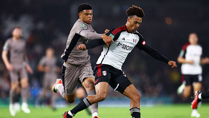 Dane Scarlett tussling with Antonee Robinson for the ball in the League Cup last August - Fulham v Tottenham Hotspur - Carabao Cup Second Round
