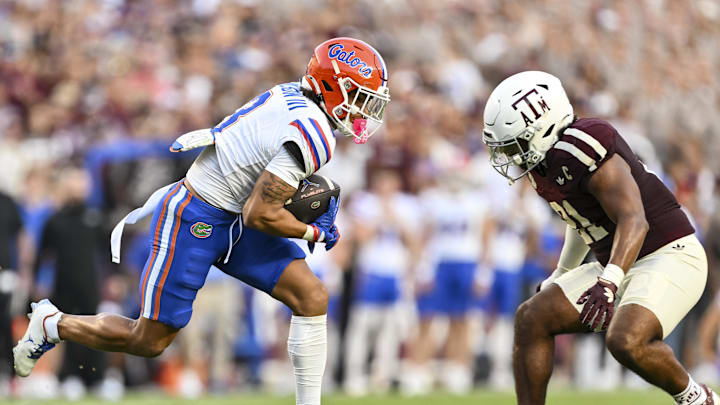 Florida Gators wide receiver Eugene Wilson III runs the ball during the first quarter against Texas A&M Aggies linebacker Taurean York