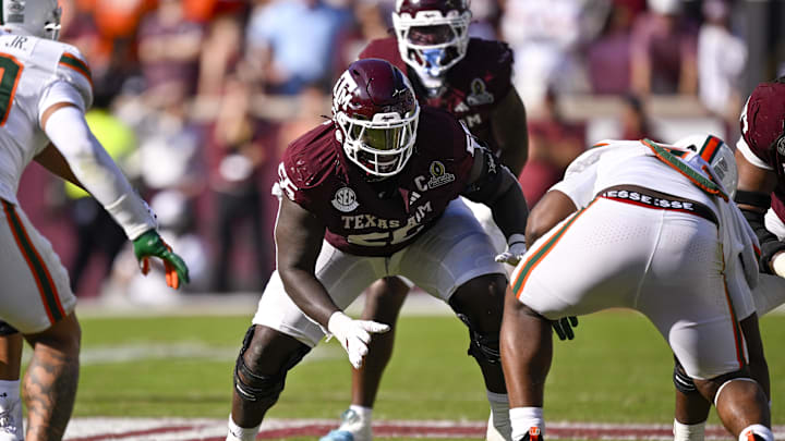 Dec 20, 2025; College Station, TX, USA; Texas A&M Aggies offensive lineman Ar'Maj Reed-Adams (55) blocks the line during the game between the Aggies and the Hurricanes at Kyle Field. Mandatory Credit: Jerome Miron-Imagn Images