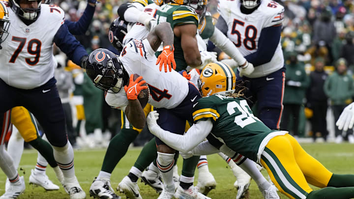 D'Andre Swift is brought down but not before he crosses the goal line against Green Bay for a touchdown at Lambeau Field. D'Andre Swift is brought down but not before he crosses the goal line against Green Bay for a touchdown at Lambeau Field.