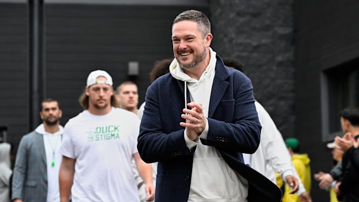Oct 11, 2025; Eugene, Oregon, USA; Oregon Ducks head coach Dan Lanning arrives with players before the game between the Indiana Hoosiers and the Oregon Ducks at Autzen Stadium. Mandatory Credit: Troy Wayrynen-Imagn Images