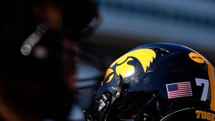 The Iowa Hawkeyes logo is pictured on a helmet during warmups before a football game against the Indiana Hoosiers Sept. 27, 2025 at Kinnick Stadium in Iowa City, Iowa. The Iowa Hawkeyes logo is pictured on a helmet during warmups before a football game against the Indiana Hoosiers Sept. 27, 2025 at Kinnick Stadium in Iowa City, Iowa.