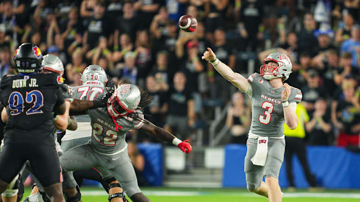 Sep 13, 2024; Kansas City, Kansas, USA; UNLV Rebels quarterback Matthew Sluka (3) throws a pass during the second half against the Kansas Jayhawks at Children's Mercy Park. Mandatory Credit: Jay Biggerstaff-Imagn Images