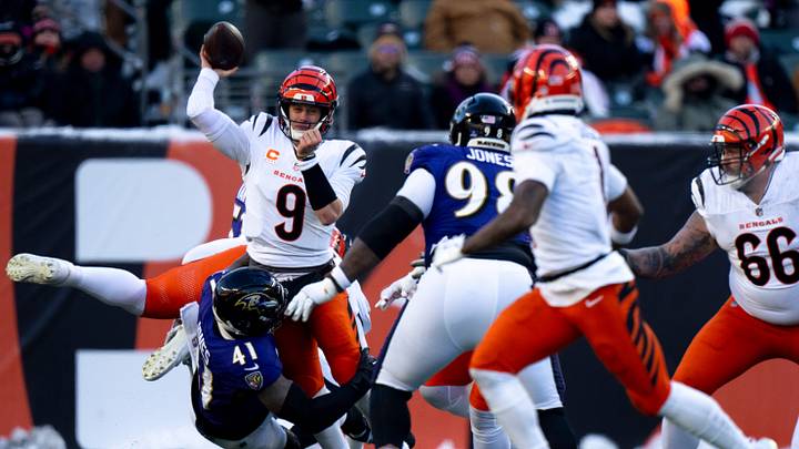Baltimore Ravens defensive end Dre'Mont Jones (41) forces Cincinnati Bengals quarterback Joe Burrow (9) to throw an incomplete pass in the fourth quarter of the NFL football game at Paycor Stadium in Cincinnati on Dec. 14, 2025. Baltimore Ravens defensive end Dre'Mont Jones (41) forces Cincinnati Bengals quarterback Joe Burrow (9) to throw an incomplete pass in the fourth quarter of the NFL football game at Paycor Stadium in Cincinnati on Dec. 14, 2025.