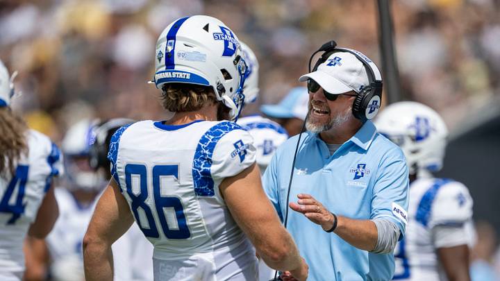 Aug 31, 2024; West Lafayette, Indiana, USA; Indiana State Sycamores head coach Curt Mallory has a word with long snapper Triston O'Brien (86) during the second quarter at Ross-Ade Stadium. Mandatory Credit: Marc Lebryk-USA TODAY Sports Aug 31, 2024; West Lafayette, Indiana, USA; Indiana State Sycamores head coach Curt Mallory has a word with long snapper Triston O'Brien (86) during the second quarter at Ross-Ade Stadium. Mandatory Credit: Marc Lebryk-USA TODAY Sports