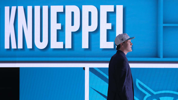 Jun 25, 2025; Brooklyn, NY, USA; Kon Knueppel looks on after being selected as the fourth pick by the Charlotte Hornets in the first round of the 2025 NBA Draft at Barclays Center. Mandatory Credit: Brad Penner-Imagn Images Jun 25, 2025; Brooklyn, NY, USA; Kon Knueppel looks on after being selected as the fourth pick by the Charlotte Hornets in the first round of the 2025 NBA Draft at Barclays Center. Mandatory Credit: Brad Penner-Imagn Images