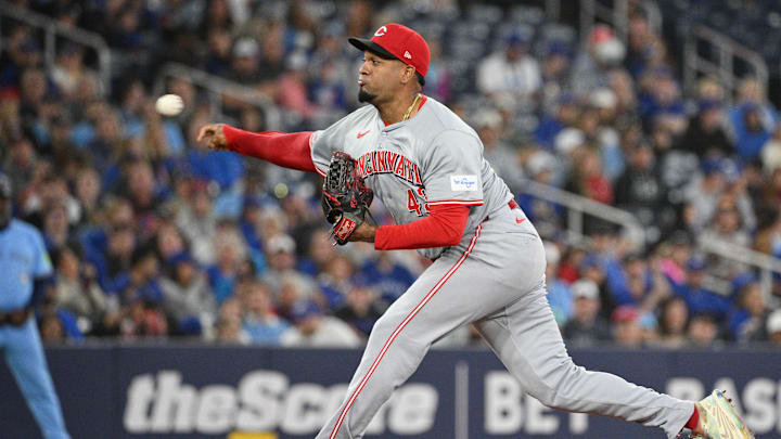 Aug 19, 2024; Toronto, Ontario, CAN; Cincinnati Reds relief pitcher Alexis Diaz (43) delivers a pitch against the Toronto Blue Jays in the ninth inning at Rogers Centre. Mandatory Credit: Dan Hamilton-Imagn Images