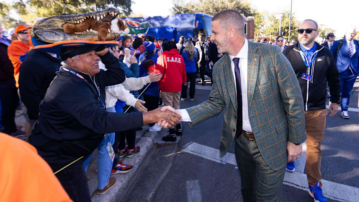 Florida Gators head coach Billy Napier participates in Gator Walk at Ben Hill Griffin Stadium in Gainesville, FL on Saturday, November 23, 2024 before the game against the University of Mississippi. [Doug Engle/Gainesville Sun]