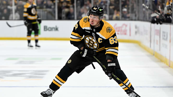 Feb 25, 2025; Boston, Massachusetts, USA; Boston Bruins left wing Brad Marchand (63) skates against the Toronto Maple Leafs during the first period at the TD Garden. Mandatory Credit: Brian Fluharty-Imagn Images