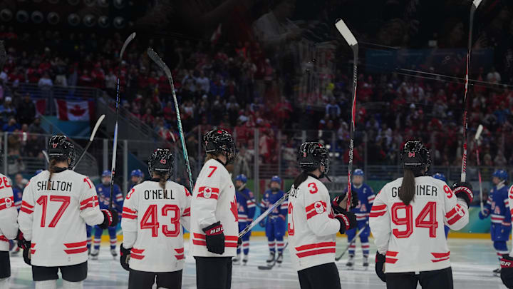 Feb 19, 2026; Milan, Italy; Team Canada takes the ice prior to the women's ice hockey gold medal game against the United States during the Milano Cortina 2026 Olympic Winter Games at Milano Santagiulia Ice Hockey Arena. Mandatory Credit: Amber Searls-Imagn Images