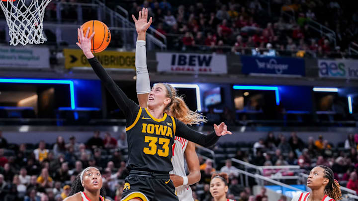 Iowa Hawkeyes guard Lucy Olsen, a Spring-Ford High School graduate, goes up for a basket Friday, March 7, 2025, in a quarterfinals game at the 2025 TIAA Big Ten Women's Basketball Tournament between the Iowa Hawkeyes and the Ohio State Buckeyes at Gainbridge Fieldhouse in Indianapolis. The Buckeyes defeated the Hawkeyes, 60-59.