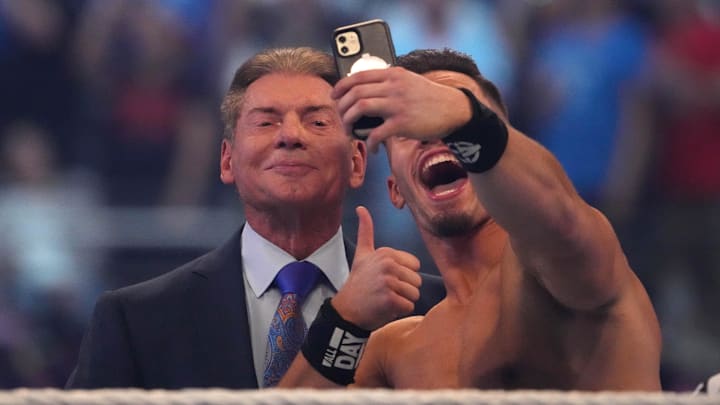 Apr 3, 2022; Arlington, TX, USA; Austin Theory takes a selfie with WWE owner Vince McMahon during WrestleMania at AT&T Stadium. Mandatory Credit: Joe Camporeale-Imagn Images