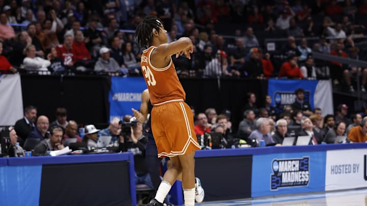 Mar 19, 2025; Dayton, OH, USA; Texas Longhorns guard Tre Johnson (20) reacts to a play in the second half against the Xavier Musketeers at UD Arena. Mandatory Credit: Rick Osentoski-Imagn Images