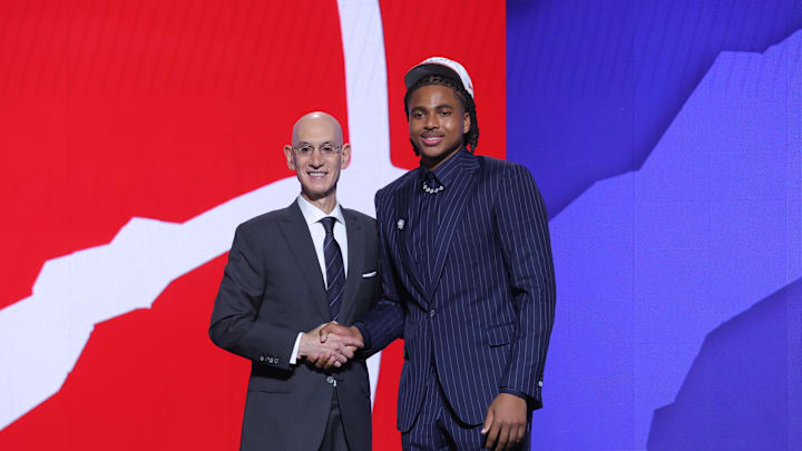 Jun 25, 2025; Brooklyn, NY, USA; Collin Murray-Boyles stands with NBA commissioner Adam Silver after being selected as the ninth pick by the Toronto Raptors in the first round of the 2025 NBA Draft at Barclays Center. Mandatory Credit: Brad Penner-Imagn Images Jun 25, 2025; Brooklyn, NY, USA; Collin Murray-Boyles stands with NBA commissioner Adam Silver after being selected as the ninth pick by the Toronto Raptors in the first round of the 2025 NBA Draft at Barclays Center. Mandatory Credit: Brad Penner-Imagn Images