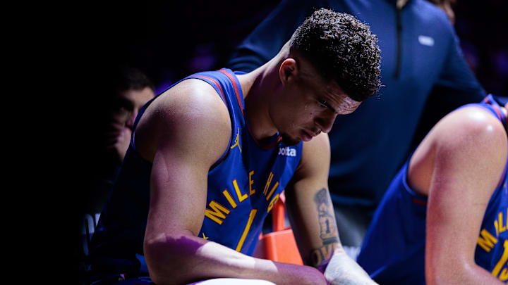 Apr 20, 2024; Denver, Colorado, USA; Denver Nuggets forward Michael Porter Jr. (1) sits 