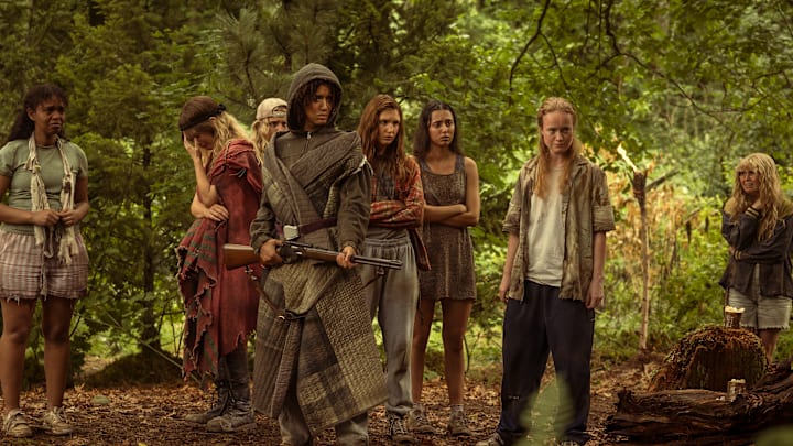 L-R: Silvana Estifanos as Teen Britt, Sophie Thatcher as Teen Natalie, Jenna Burgess as Teen Melissa, Jasmin Savoy Brown as Teen Taissa, Sophie Nélisse as Teen Shauna, Anisa Harris as Teen Robin, Liv Hewson as Teen Van, and Samantha Hanratty as Teen Misty in Yellowjackets season 3