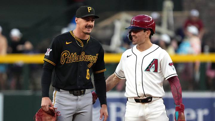 May 5, 2026; Phoenix, Arizona, USA; Pittsburgh Pirates shortstop Konnor Griffin (6) and Arizona Diamondbacks right fielder Corbin Carroll (7) talk in the first inning at Chase Field. Mandatory Credit: Rick Scuteri-Imagn Images